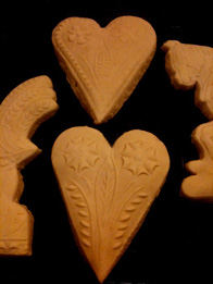 baked heart cookies cut out with wood cookie mold