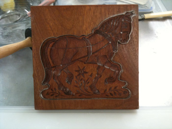 horse cookie dough cut out with wood cookie mold